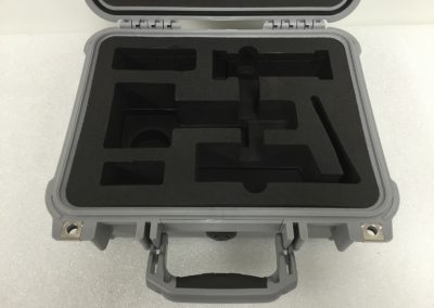 Small returnable case insert protecting precision parts