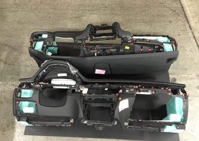 Returnable dashboard and interior part packaging for automotive assembly