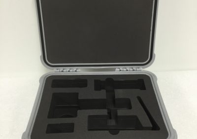 Small returnable case insert protecting precision parts