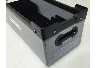 Returnable shipping container with molded part pockets