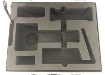 Small returnable case insert protecting precision parts