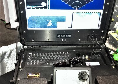 Plug-and-play case with lid-mounted monitor